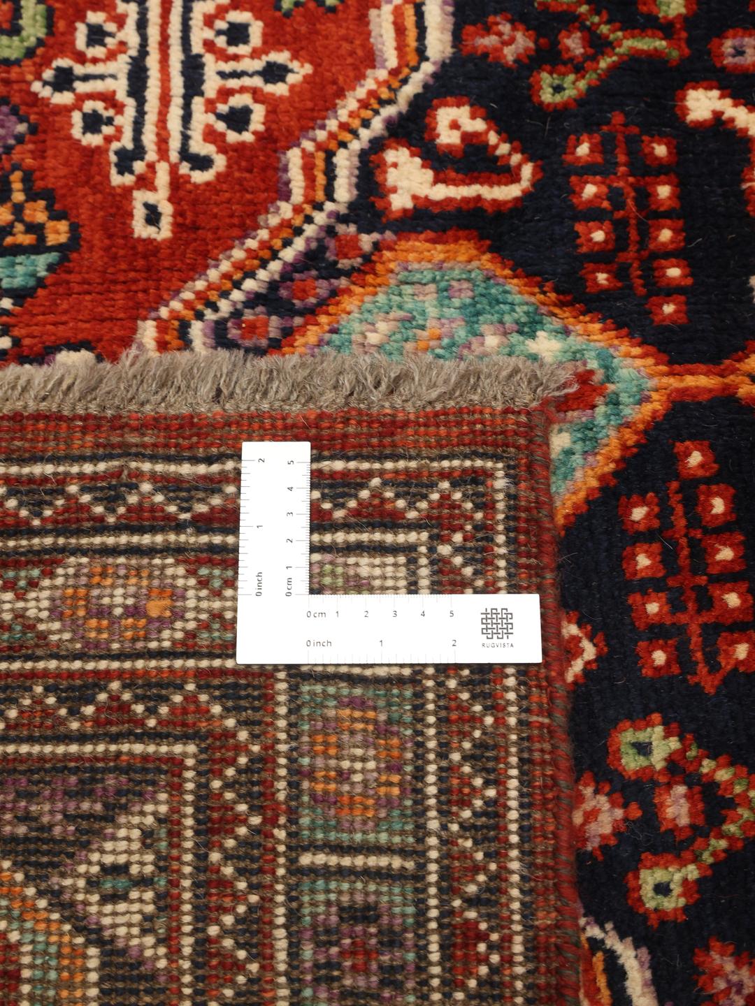 Kazak rug from Afghanistan in red