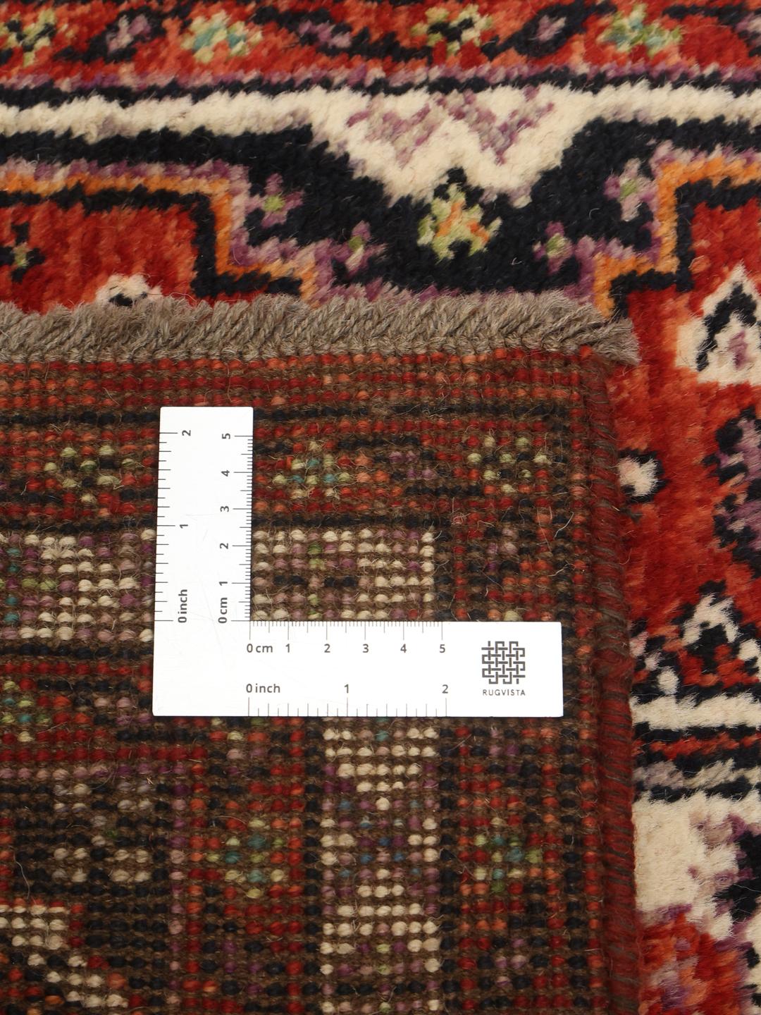 Covor tip runner lucrat manual din Afganistan în culorile roșu și bleumarin