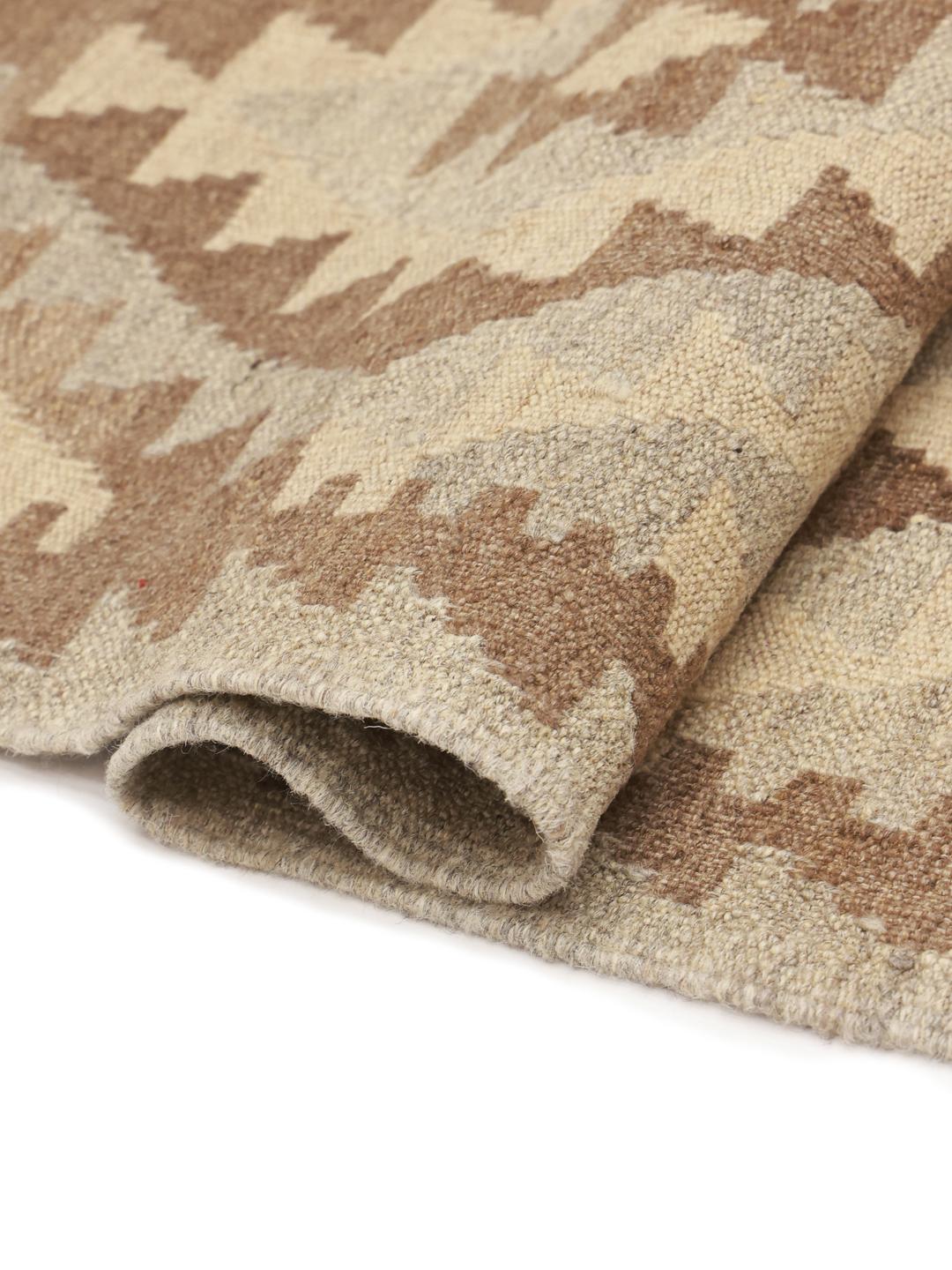 Handmade brown Afghan Kelim rug with geometric pattern