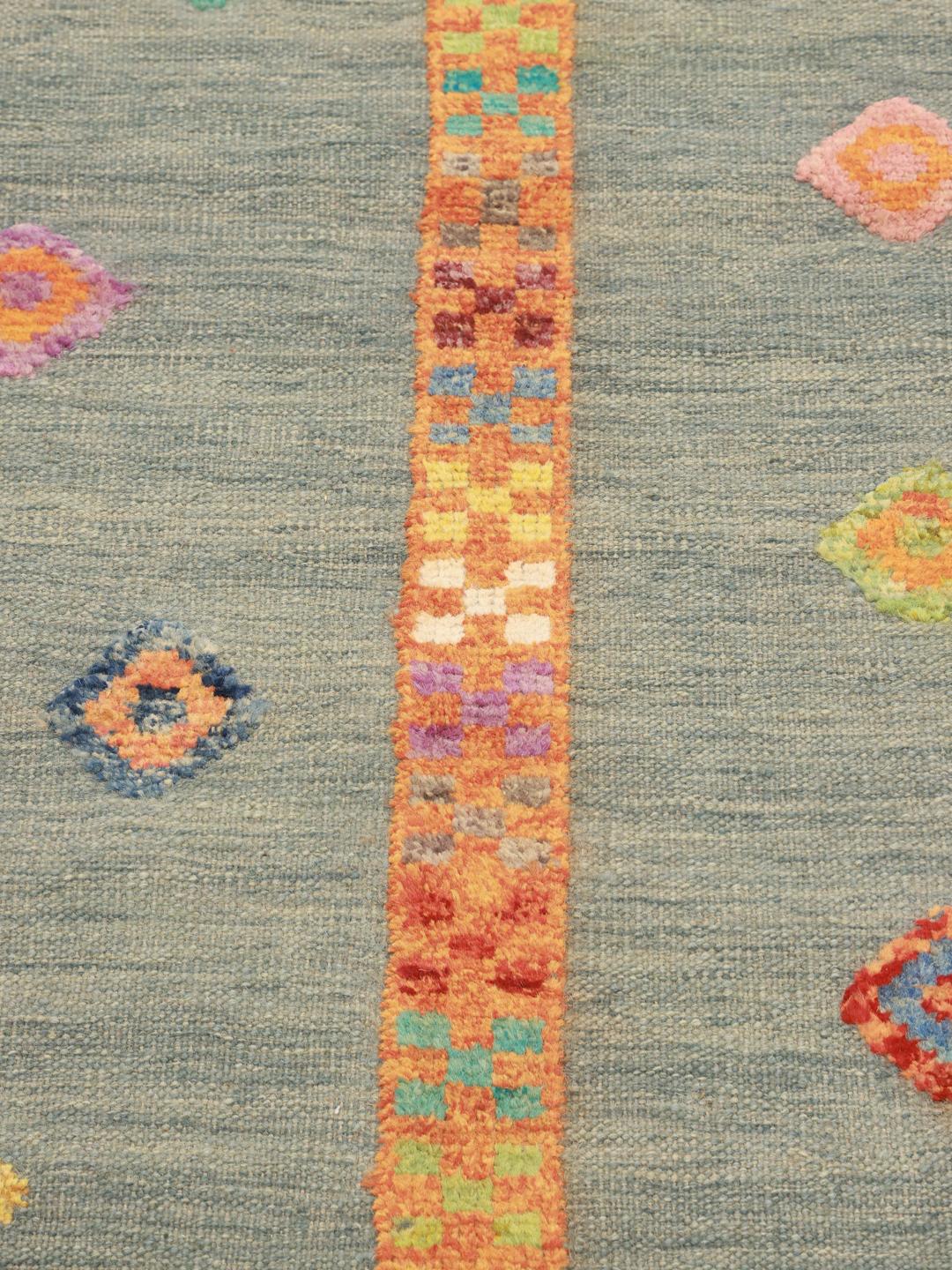 Rug from Afghanistan in blue with diamond pattern