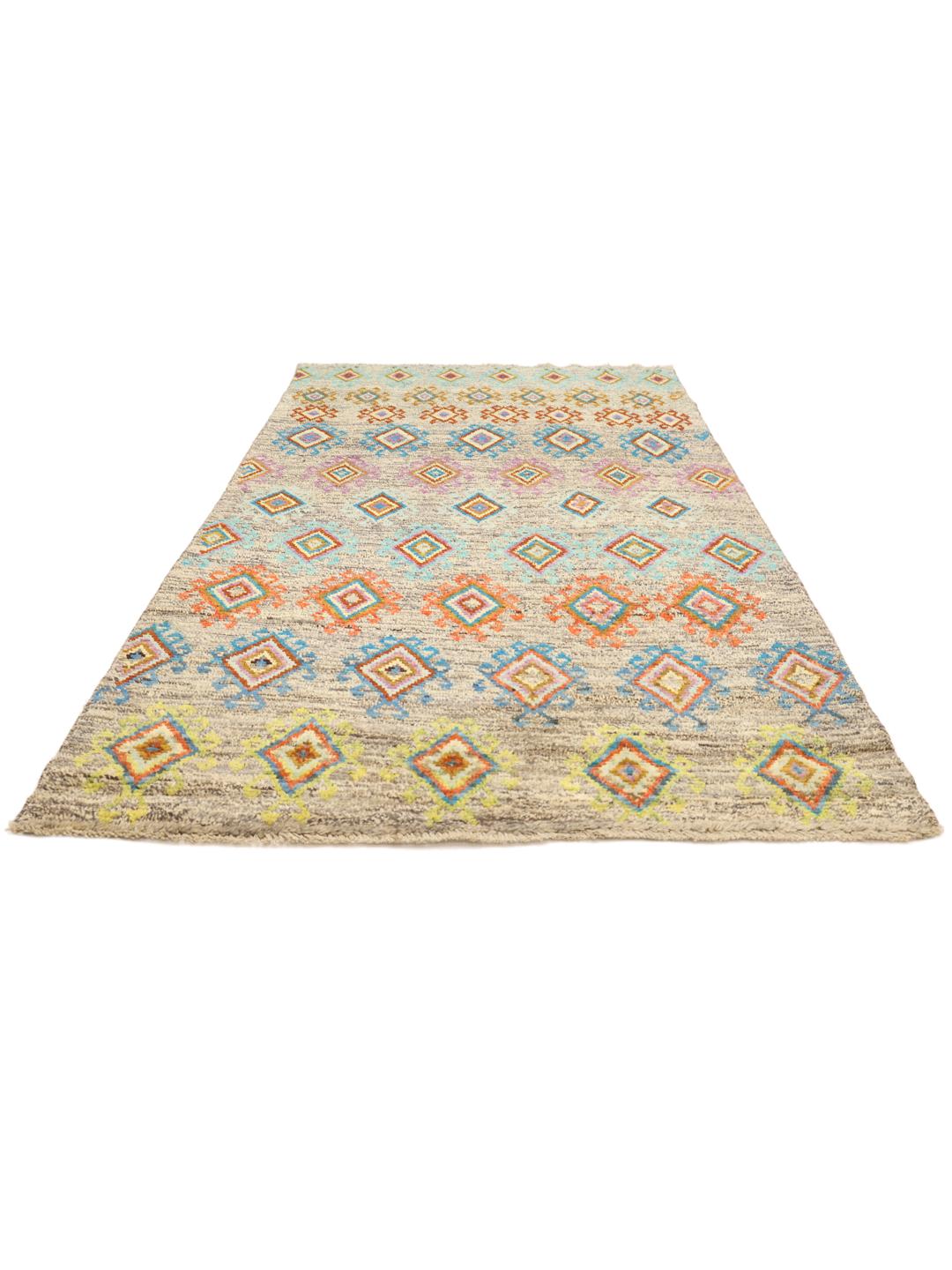 Hand-knotted Afghan rug with colourful geometric patterns on a grey background