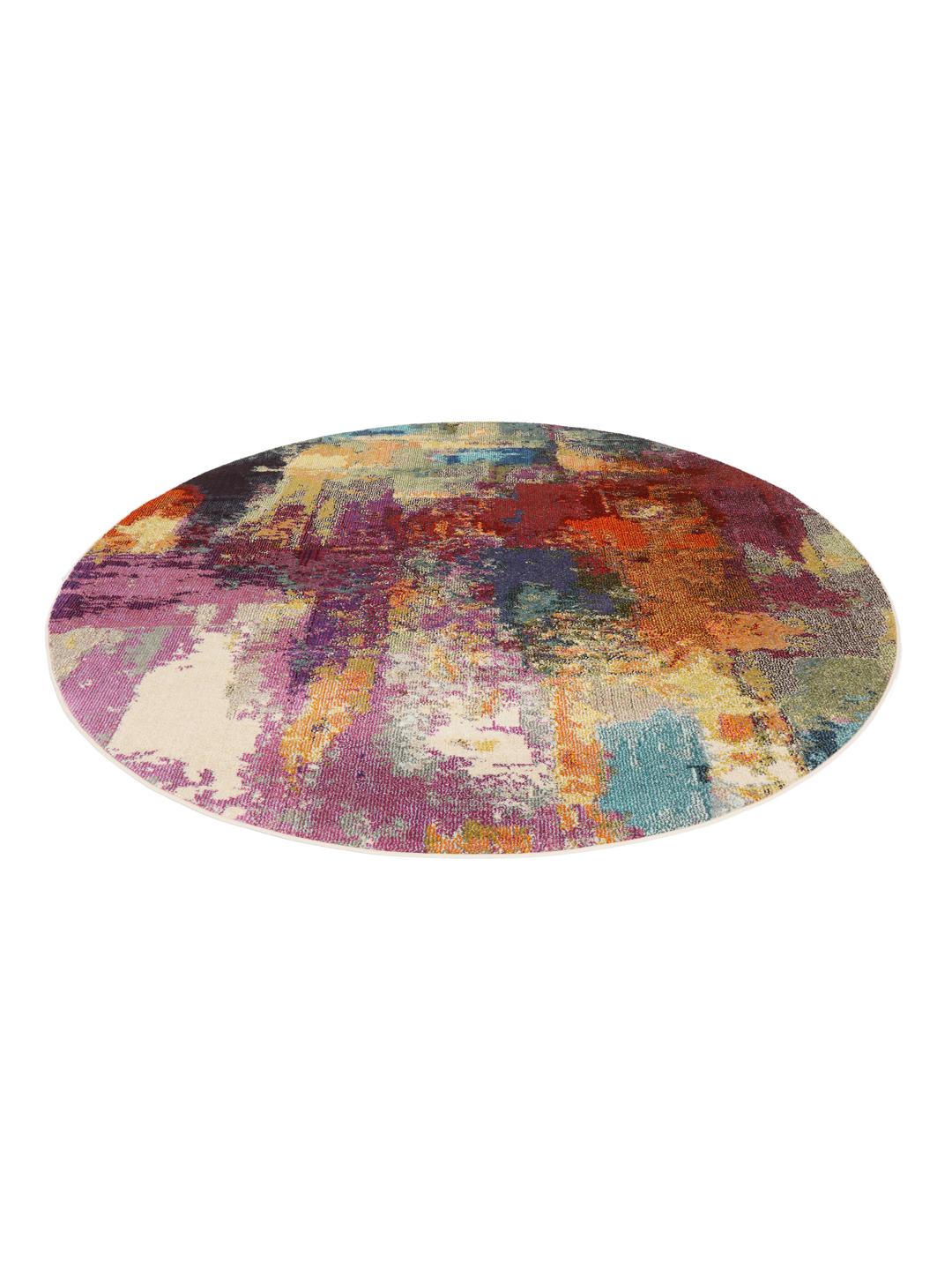 Tapis rond multicolore avec un design abstrait texturé