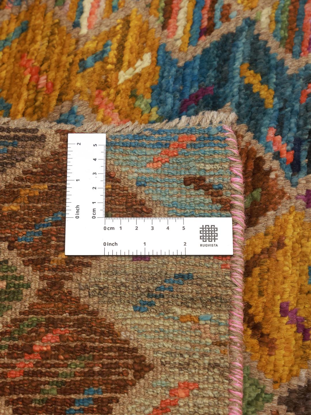 Hand-knotted Afghan runner with a colourful diamond pattern in shades of blue, orange, and brown
