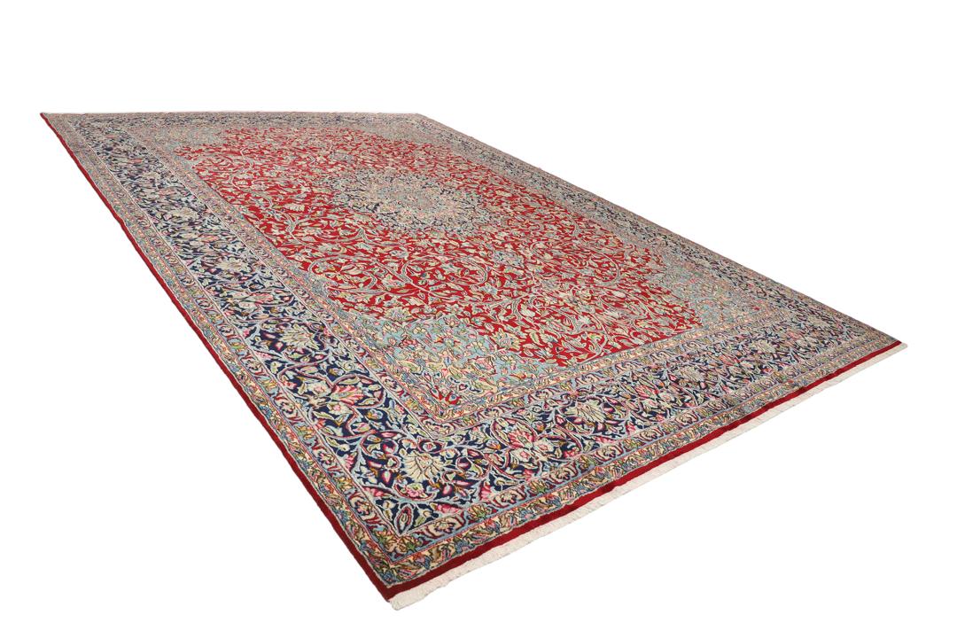 Handgeknoopt rood vloerkleed met traditionele motieven uit het Midden-Oosten van Kerman