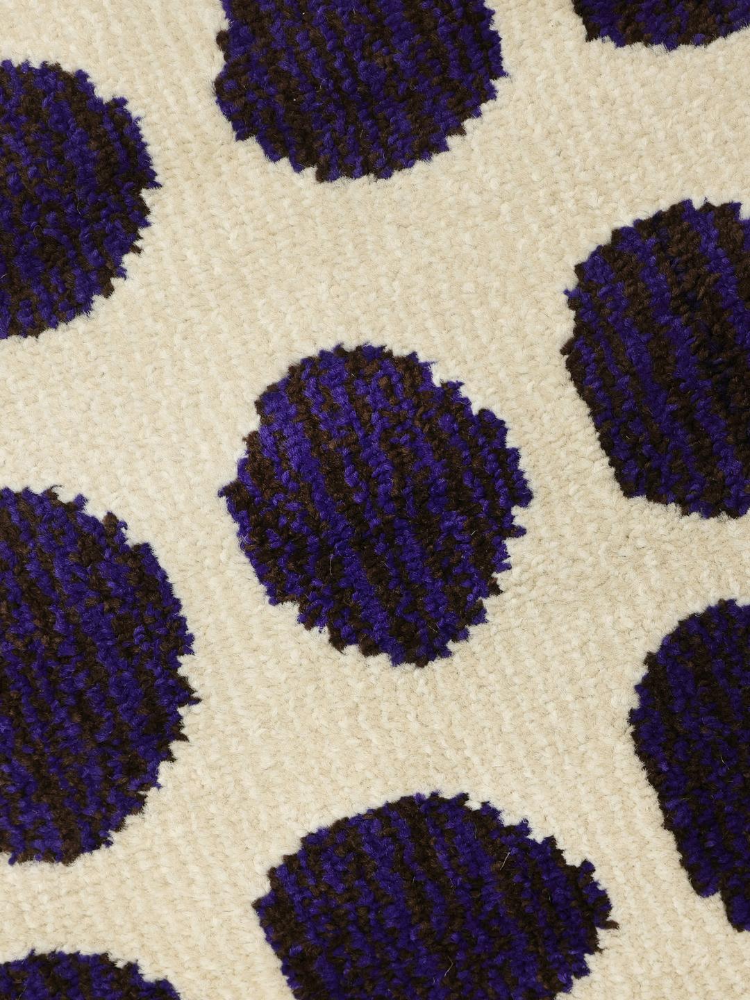 Tappeto a pois beige e blu scuro