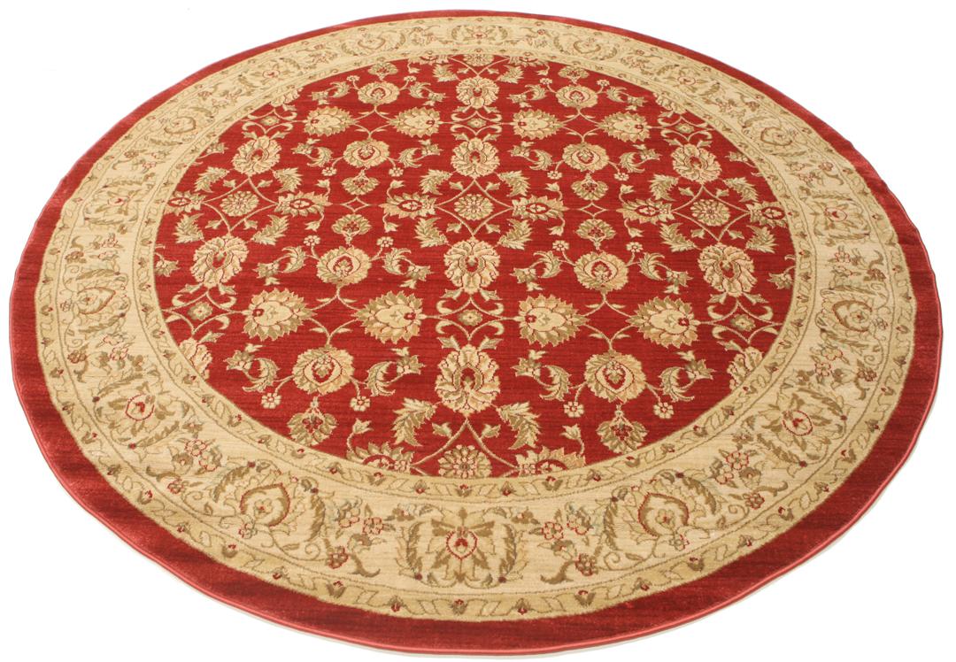 Rond rood tapijt met bloemenpatroon