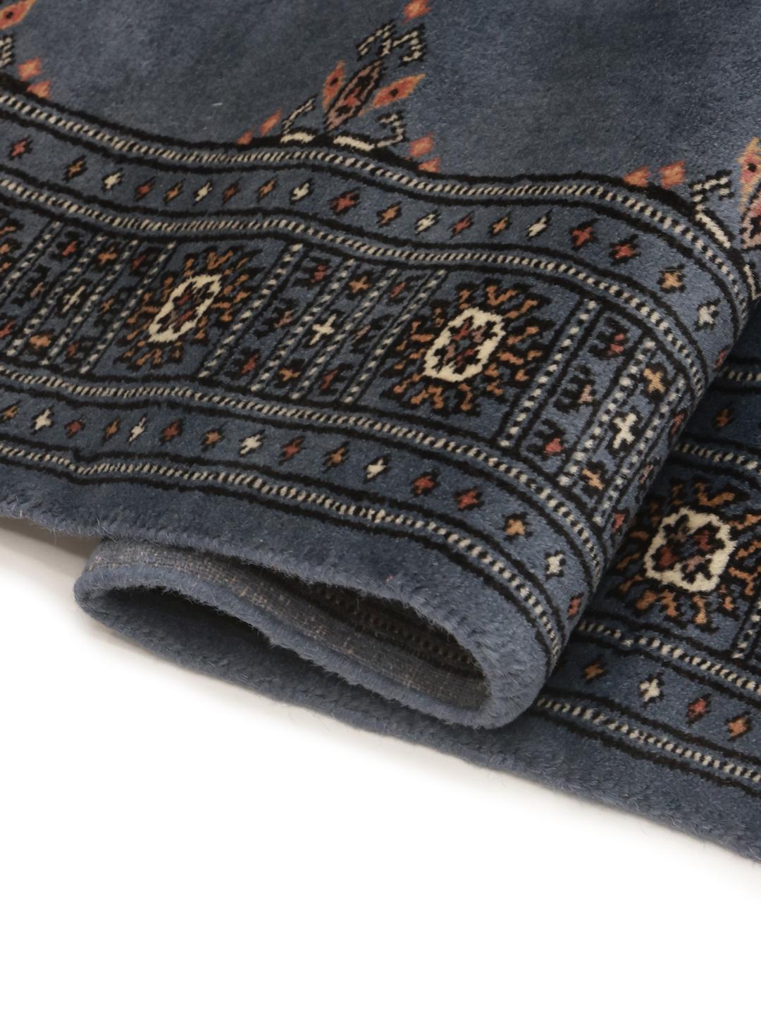 Handmade runner rug from Pakistan in blue with wool pile