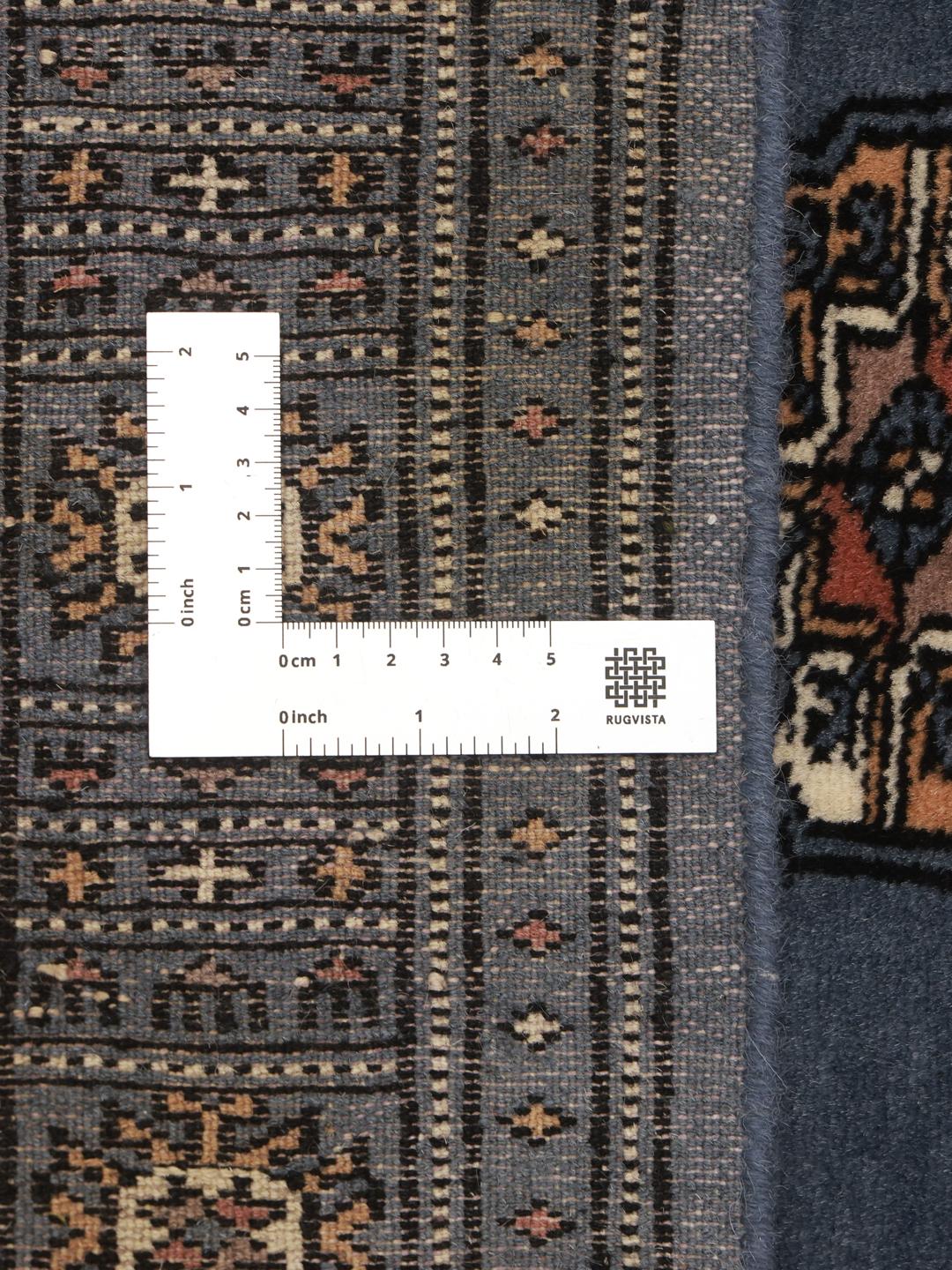 Handmade runner rug from Pakistan in blue with wool pile