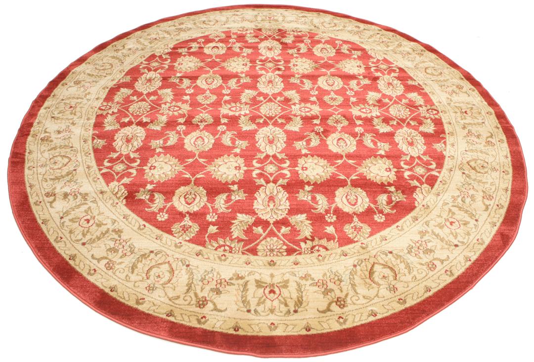 Rond rood tapijt met bloemenpatroon