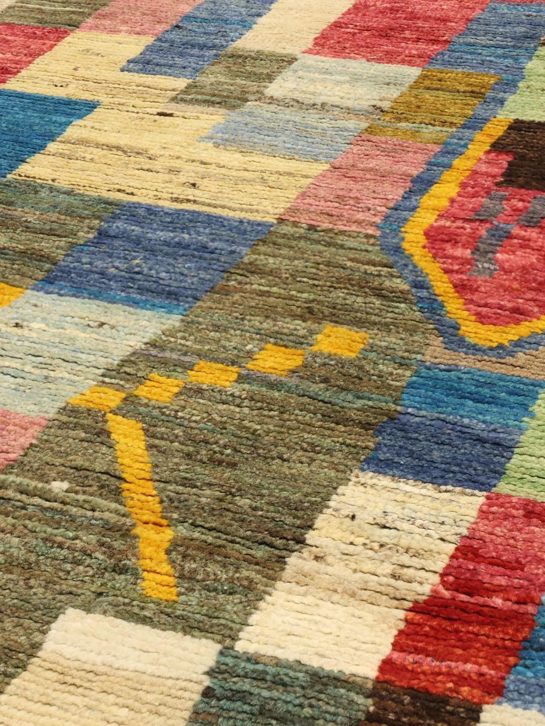 Hand-knotted multicolour rug from Afghanistan with a vibrant artistic design