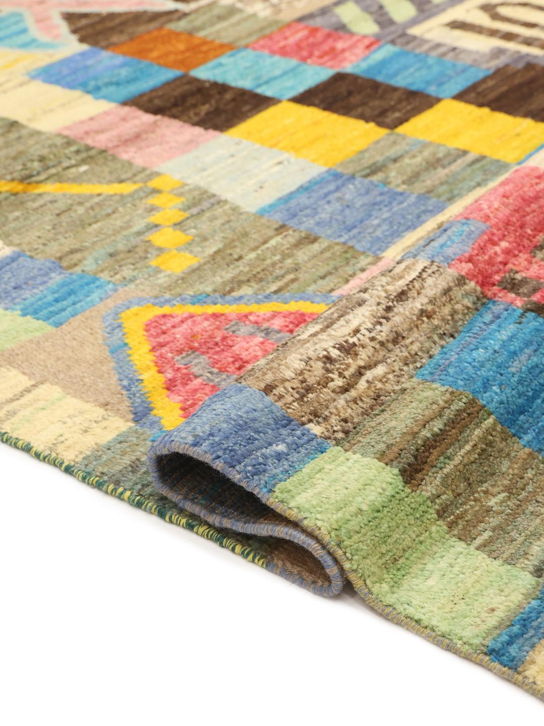 Hand-knotted multicolour rug from Afghanistan with a vibrant artistic design