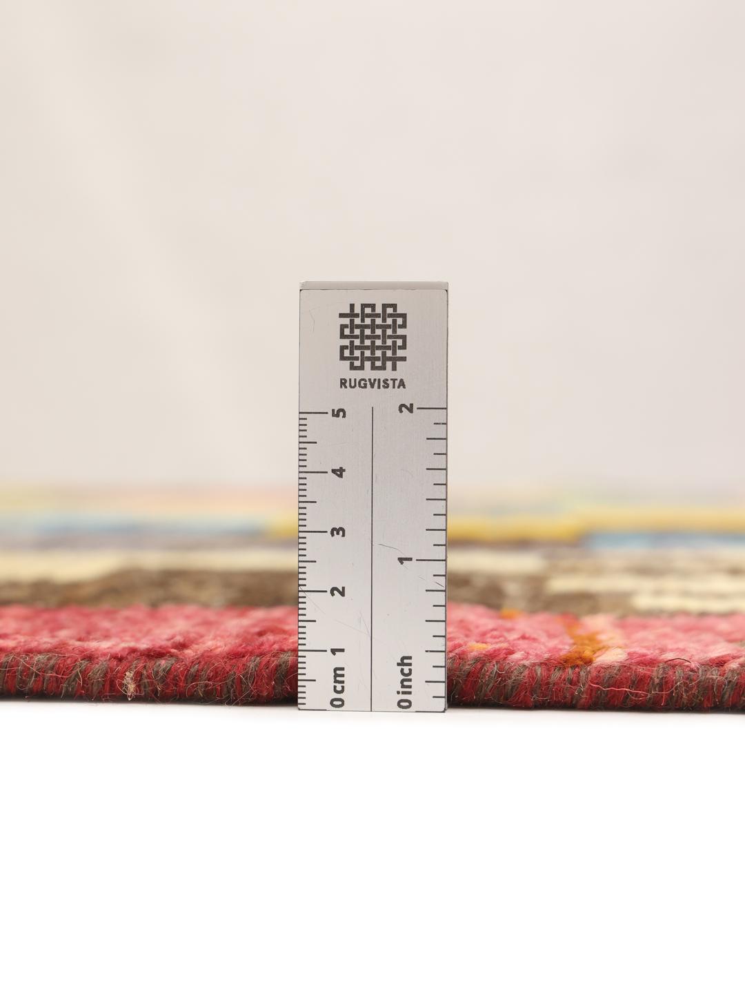 Hand-knotted multicolour rug from Afghanistan with a vibrant artistic design