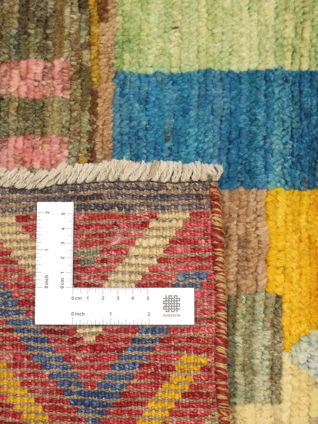 Hand-knotted multicolour rug from Afghanistan with a vibrant artistic design