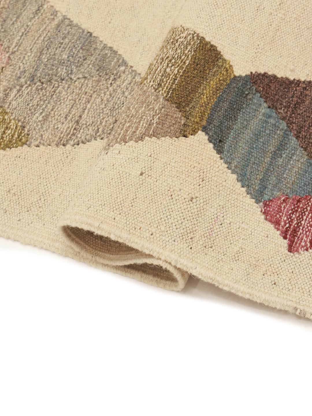 Hand-woven Afghan rug in beige