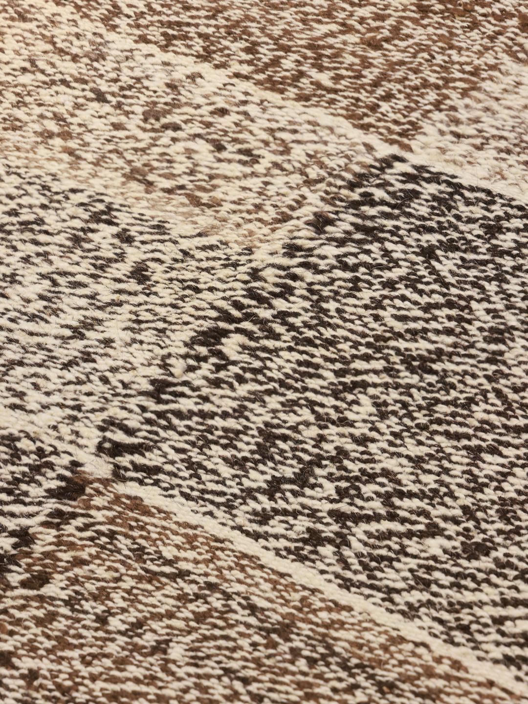 Rug from Afghanistan in brown