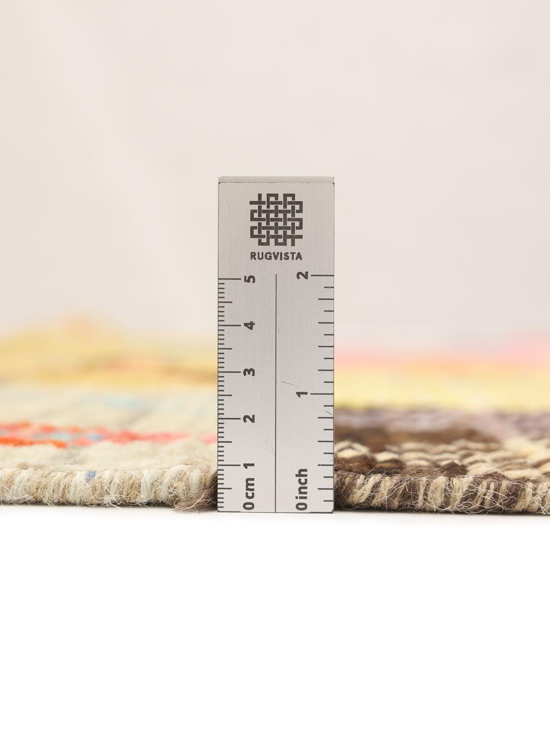 Handgeknoopt Afghaans kleed met levendige veelkleurige geometrische patronen