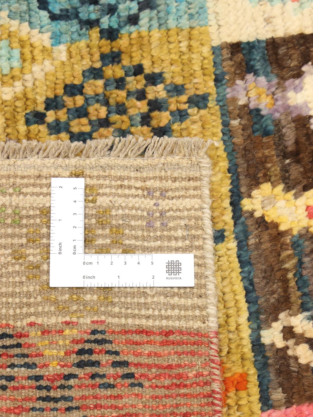 Handgeknoopt Afghaans kleed met levendige veelkleurige geometrische patronen