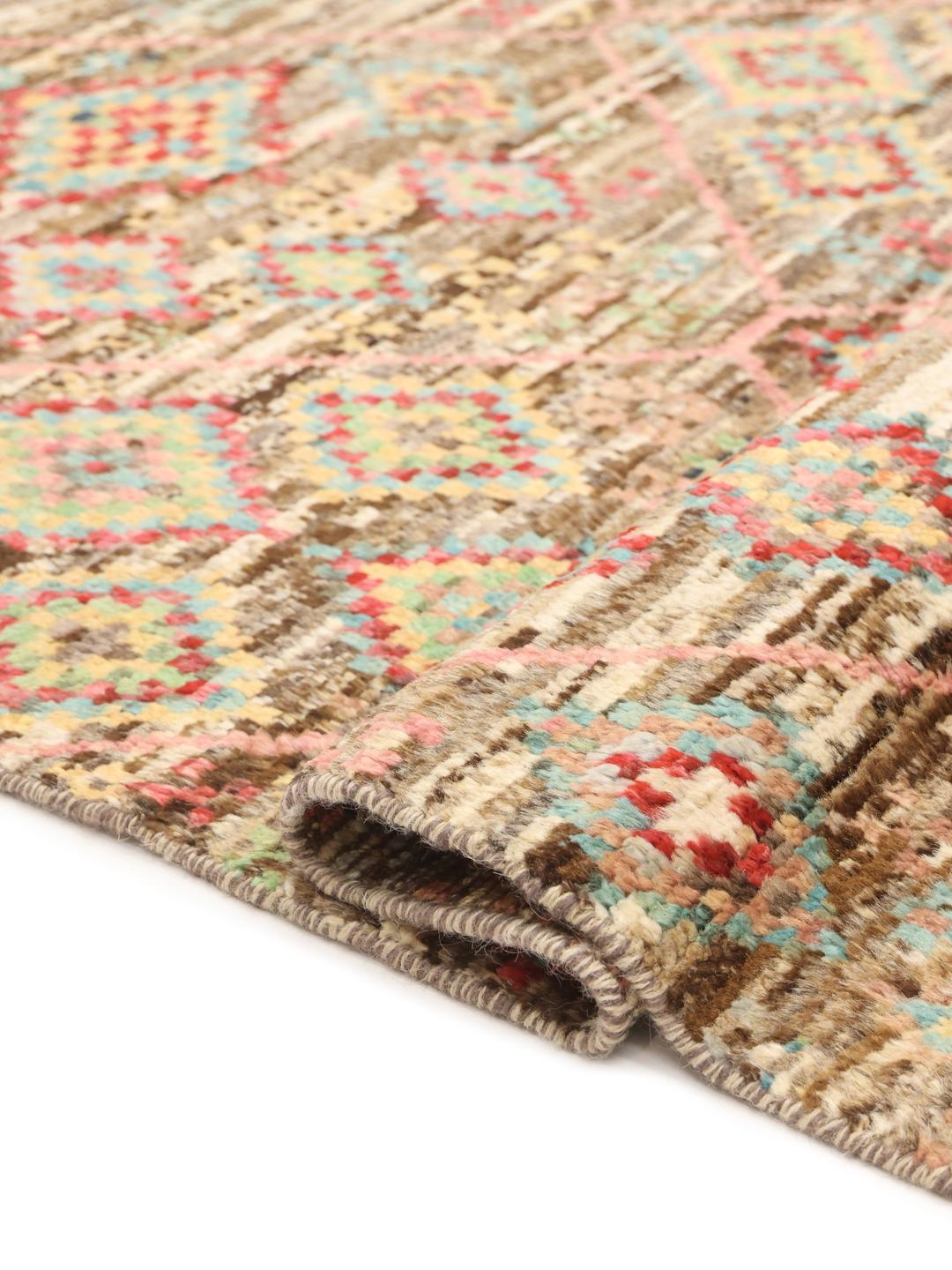 Hand-knotted Afghan rug with colourful geometric diamond patterns on a brown field