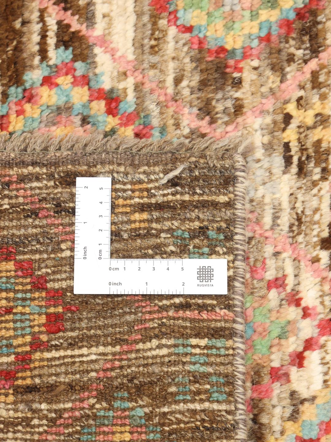 Hand-knotted Afghan rug with colourful geometric diamond patterns on a brown field