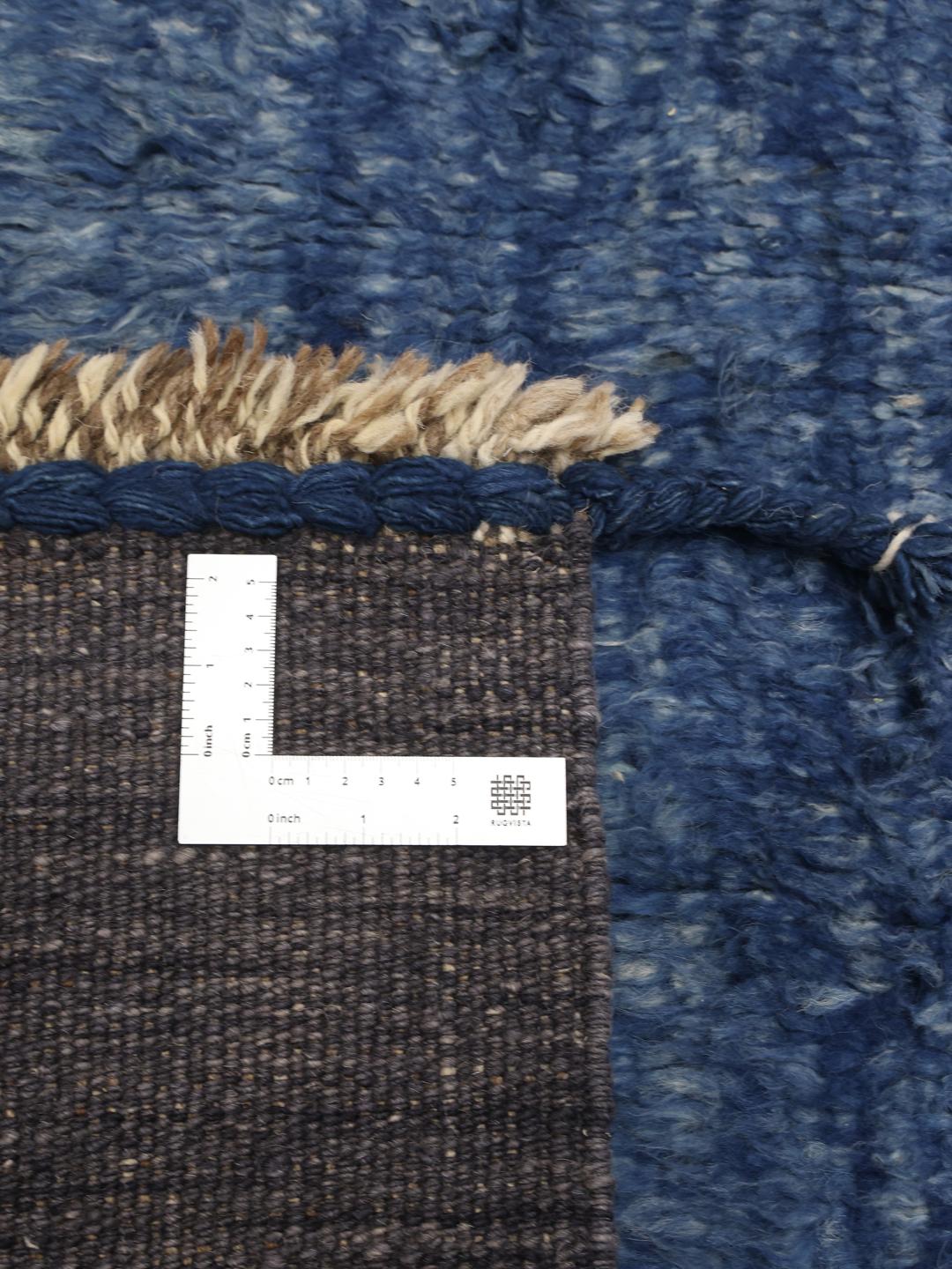 Handgemaakt wollen kleed uit Afghanistan in blauw
