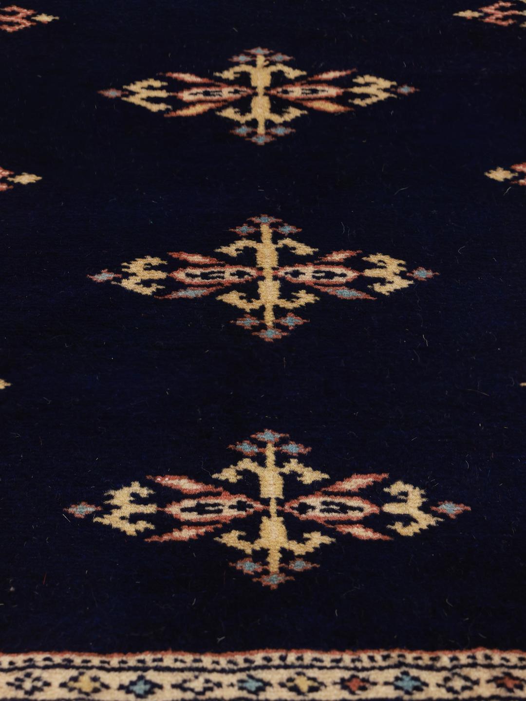 Handmade runner rug from Pakistan in dark-blue