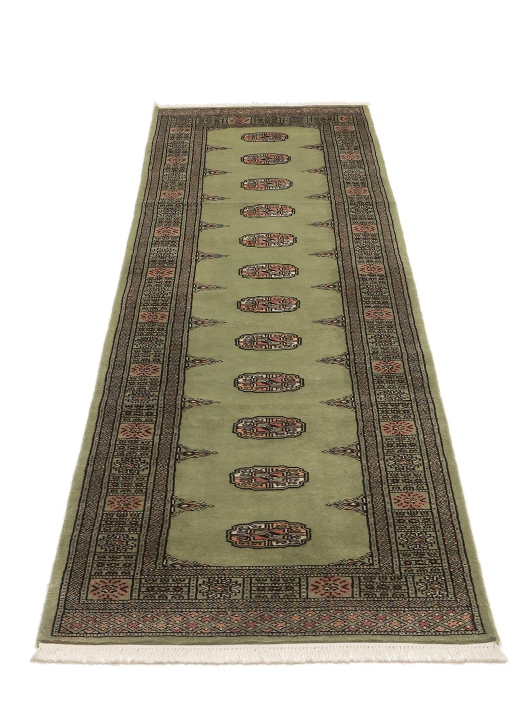 Handmade green Bokhara runner rug from Pakistan
