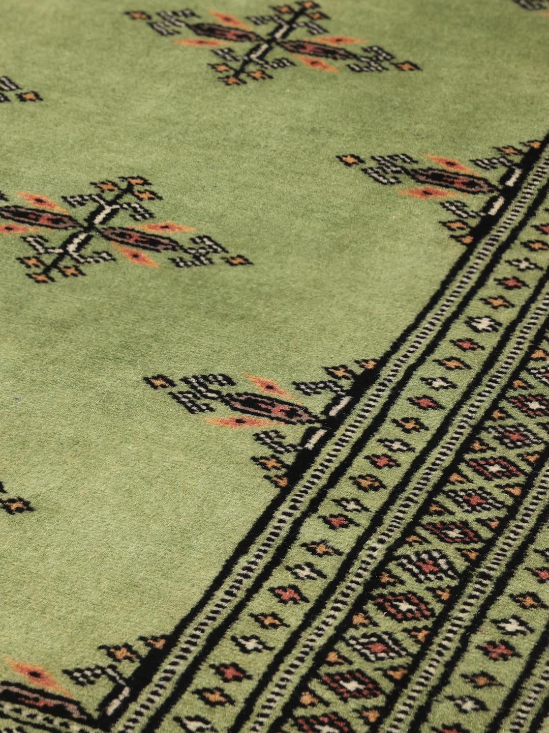 Handmade Pakistani rug in green