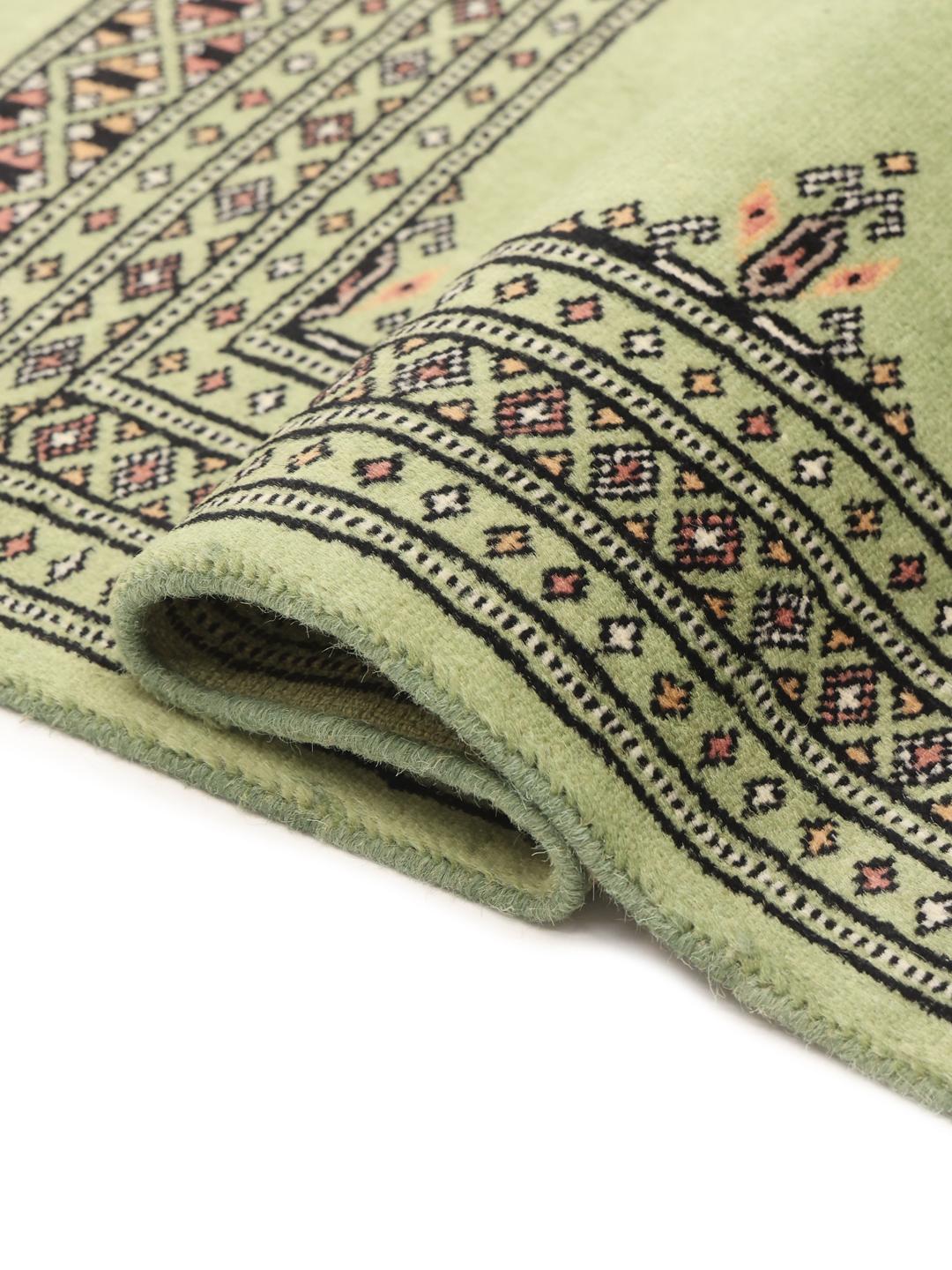 Handmade Pakistani rug in green