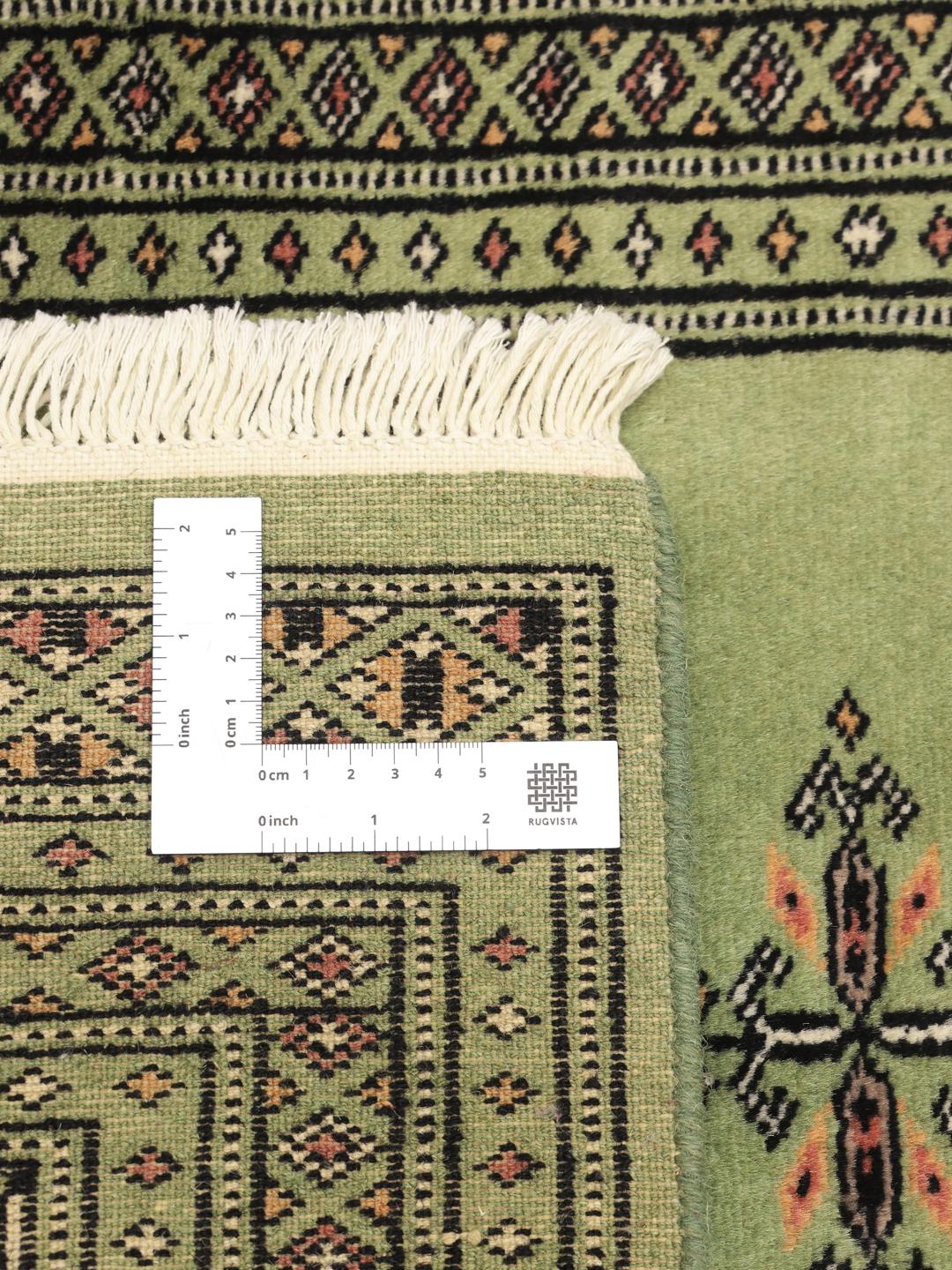 Handmade Pakistani rug in green