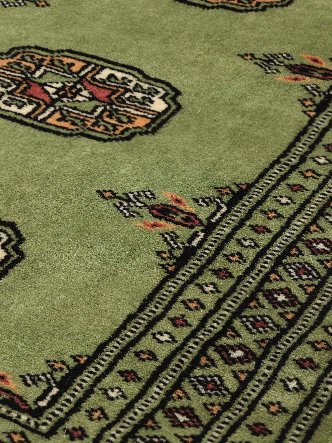 Handmade Pakistan rug in light-green