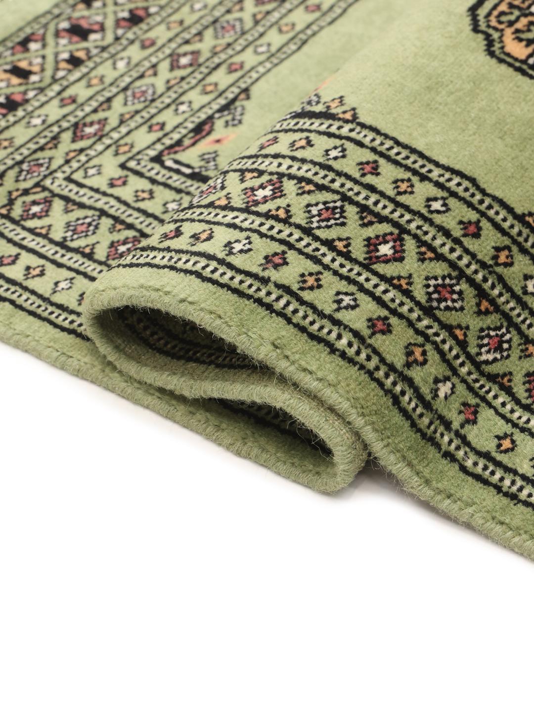 Handmade Pakistan rug in light-green