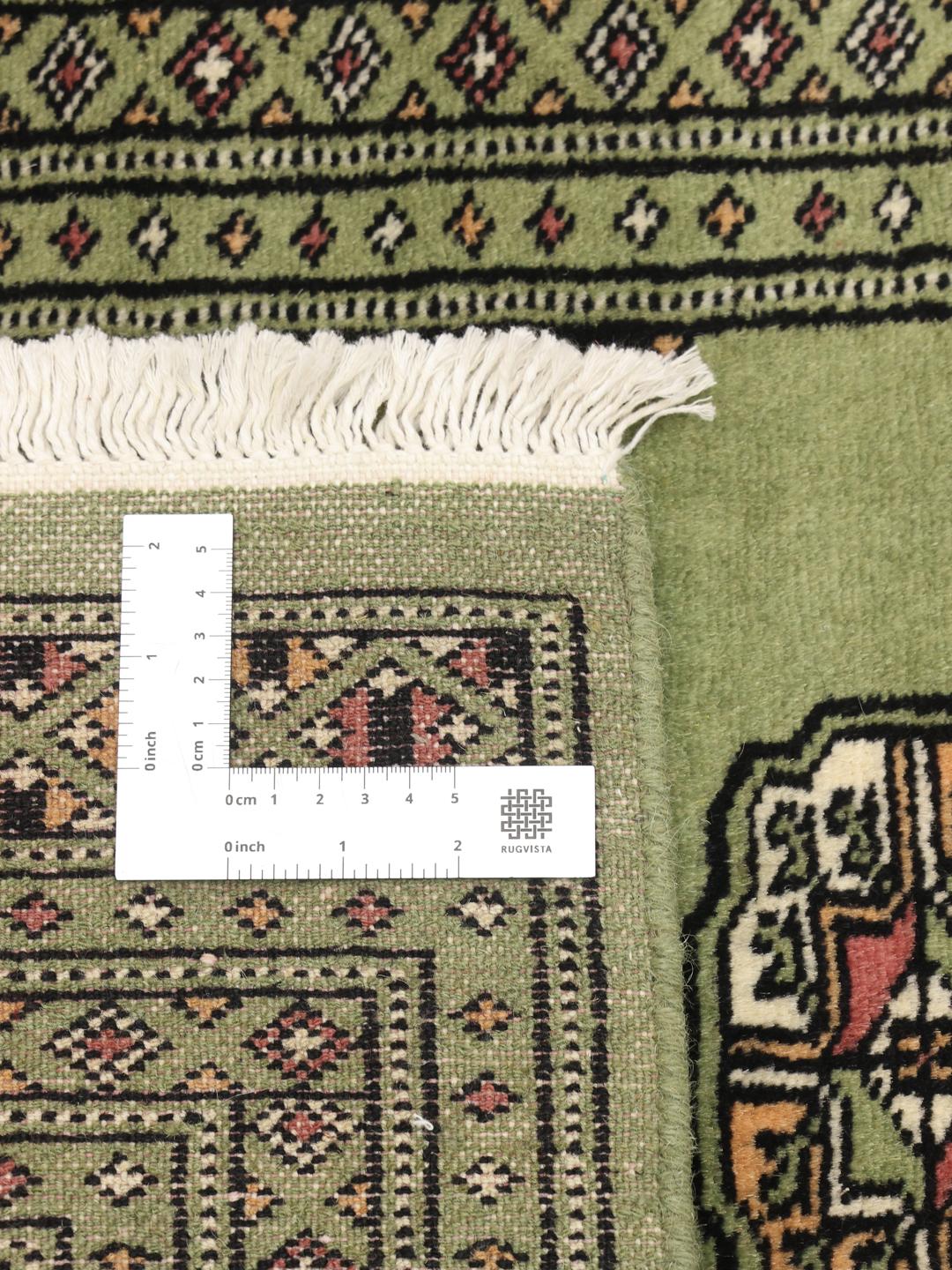 Handmade Pakistan rug in light-green