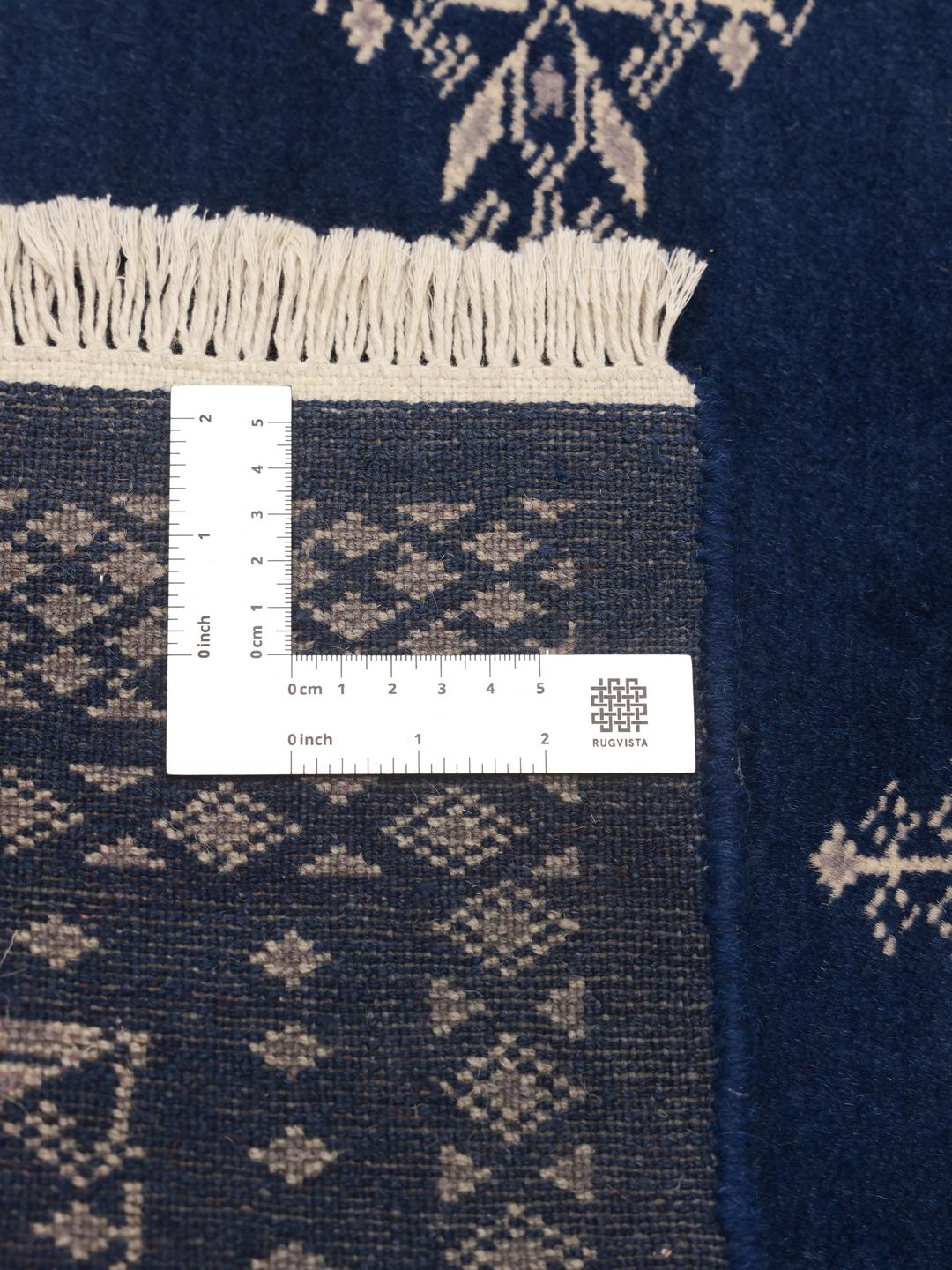 Handmade Pakistan rug in dark-blue