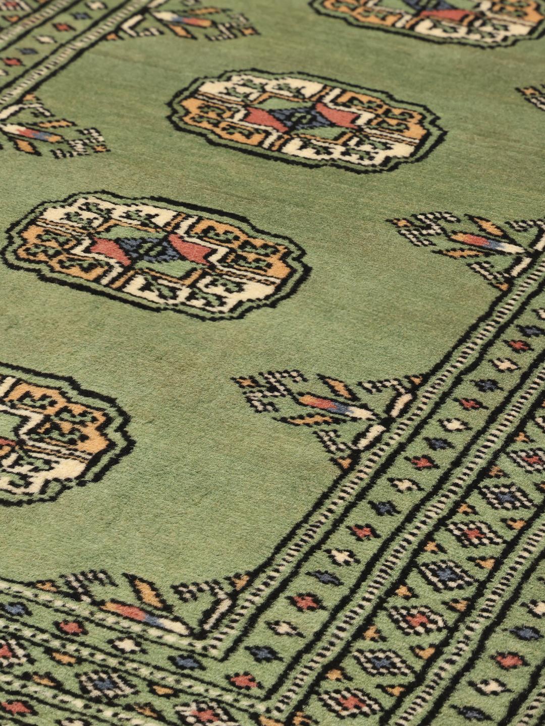 Handmade Pakistan Bokhara green rug