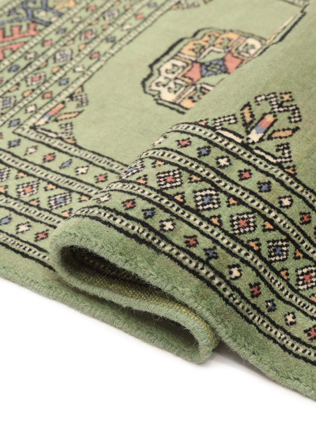 Handmade Pakistan Bokhara green rug