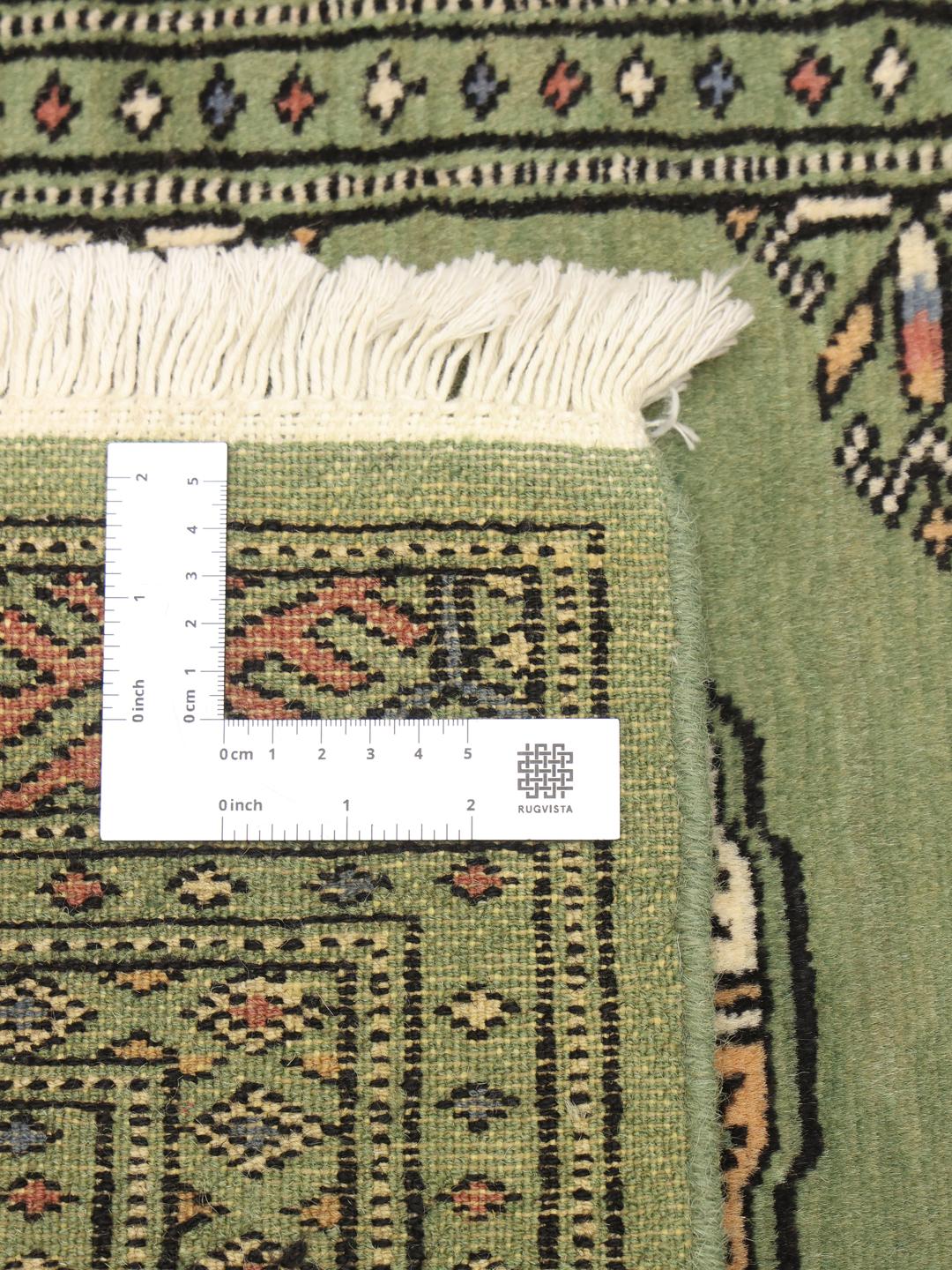 Handmade Pakistan Bokhara green rug