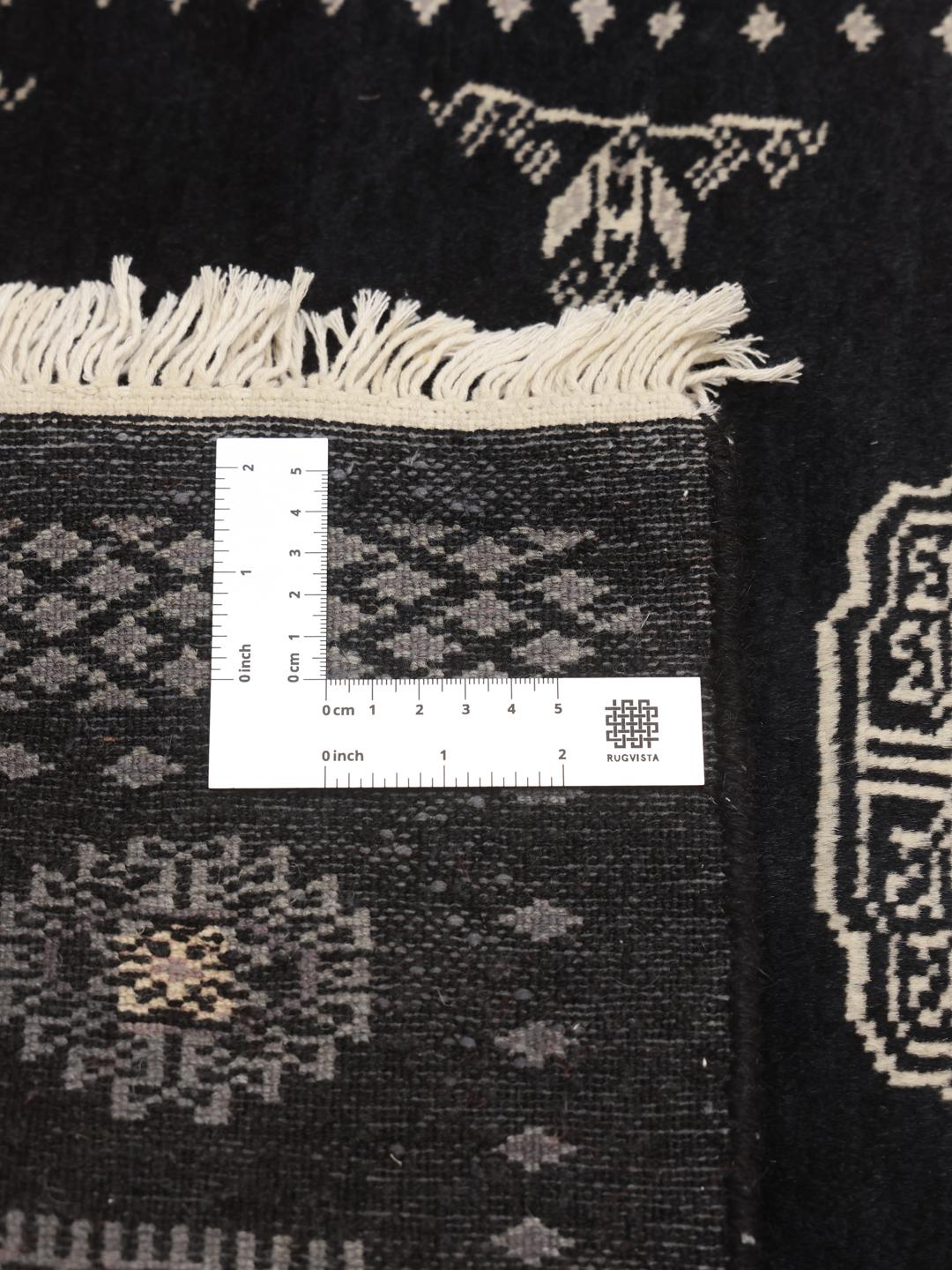 Handmade Pakistani wool rug in black