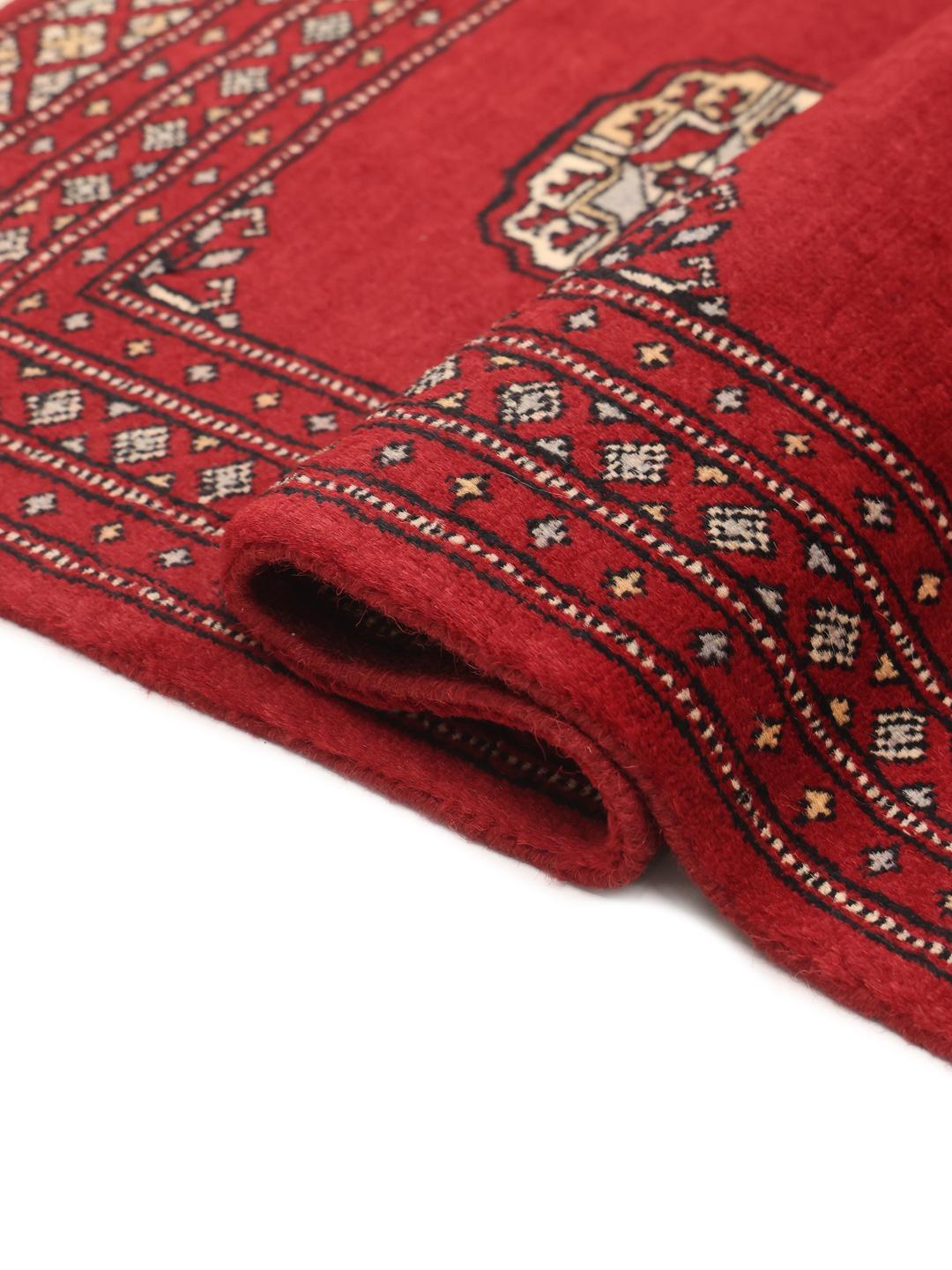 Handmade Pakistan Bokhara 2ply red rug