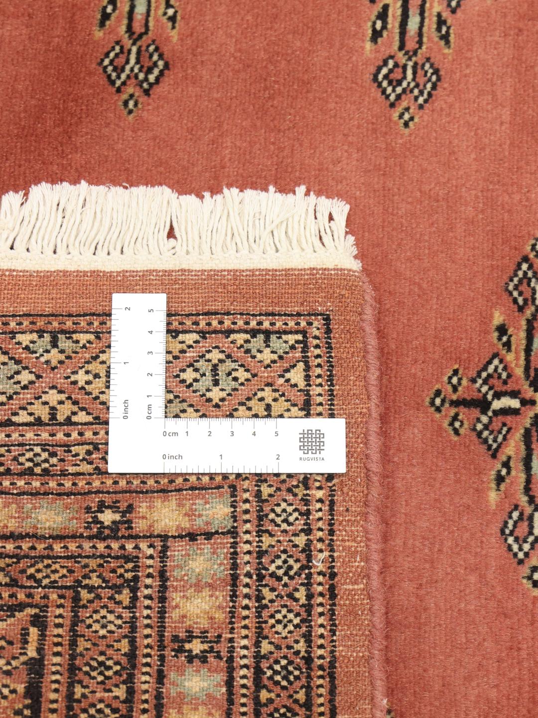 Handmade red Bokhara rug from Pakistan