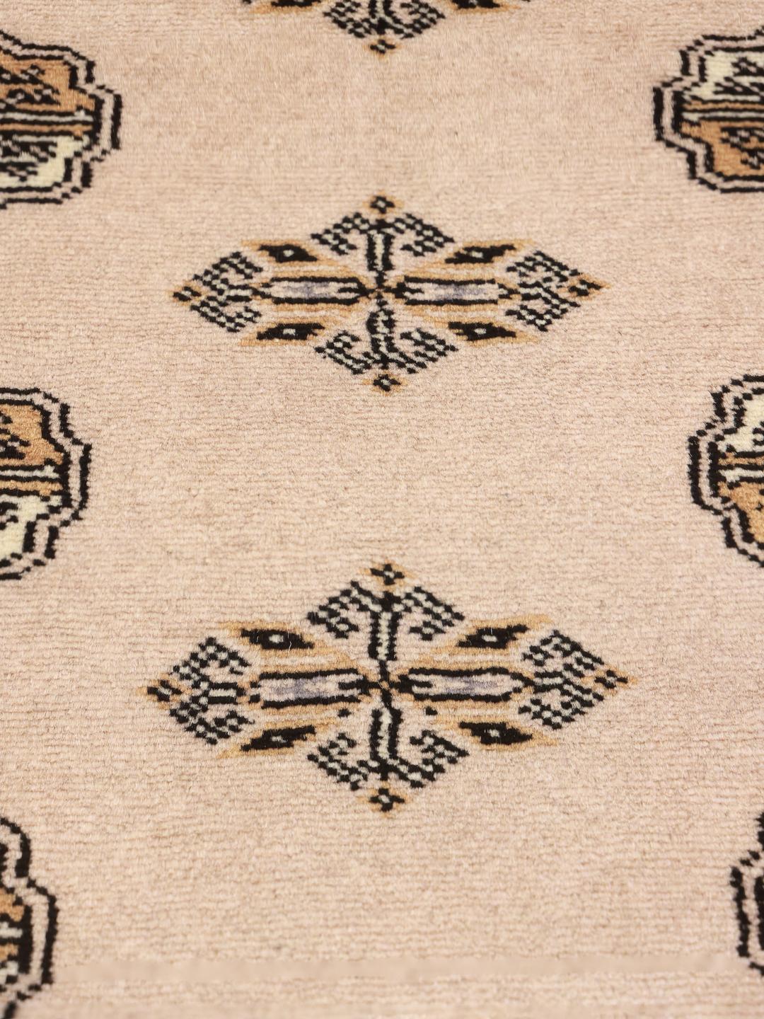 Handmade Pakistan rug in beige