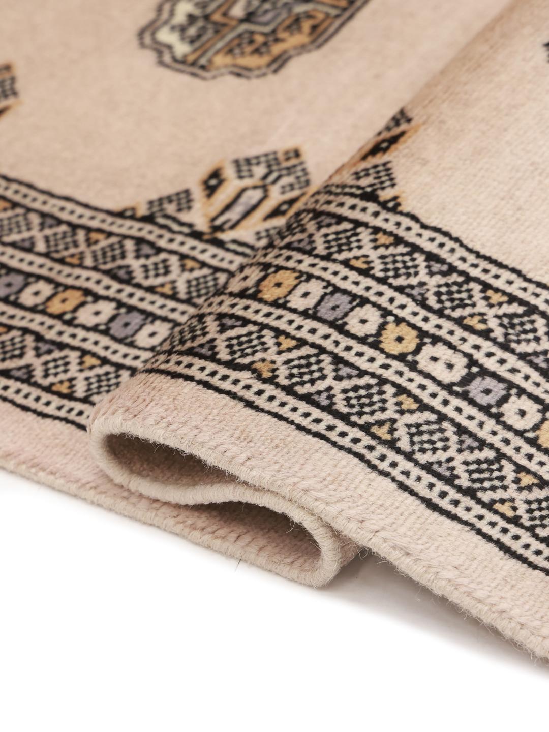 Handmade Pakistan rug in beige