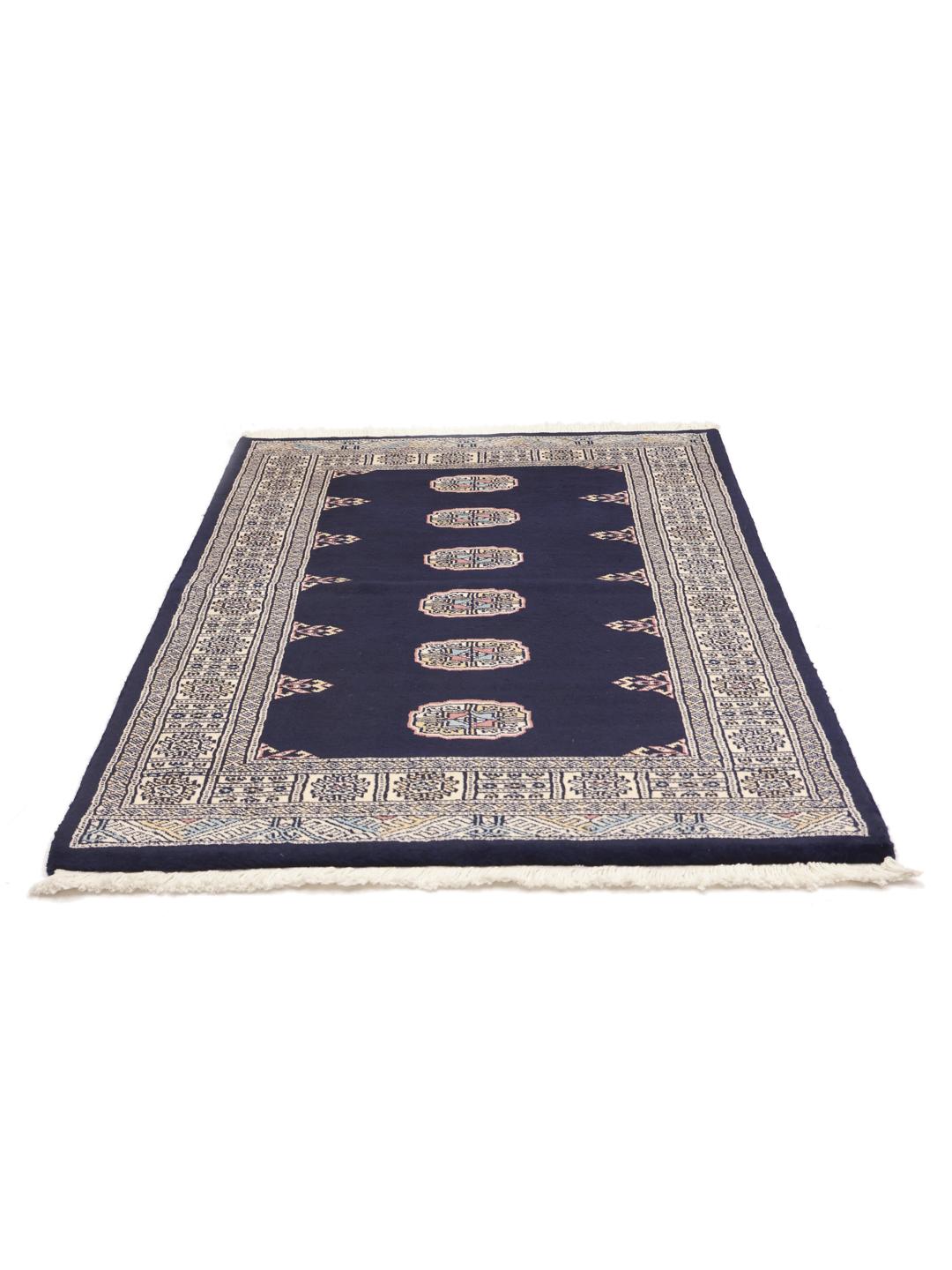 Handmade rug from Pakistan in dark blue