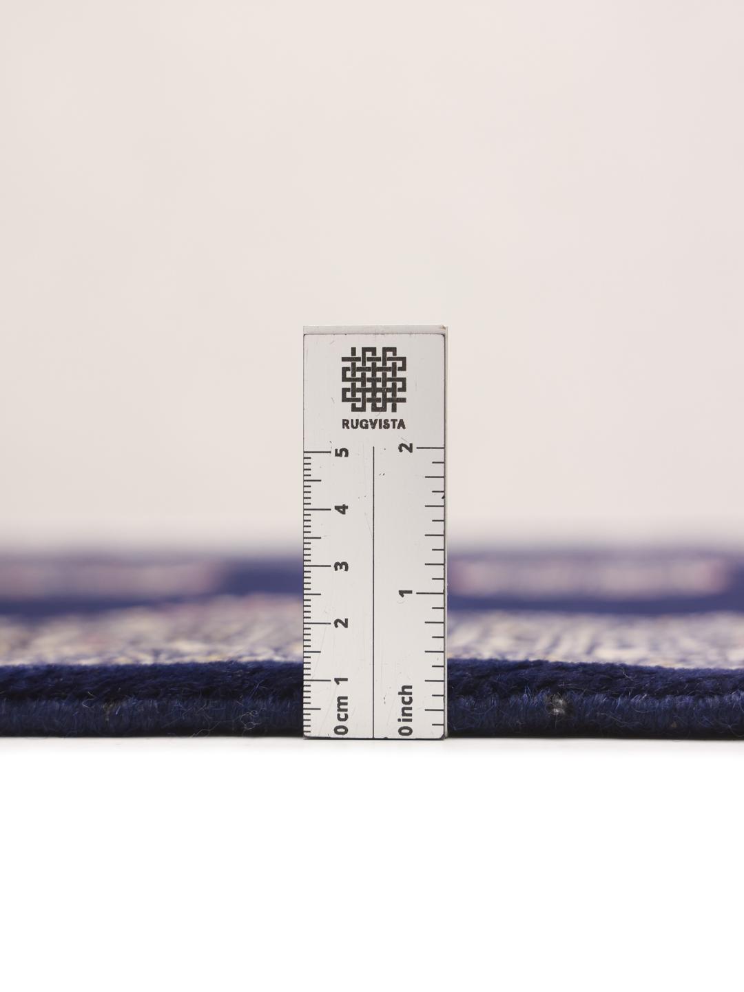 Handmade rug from Pakistan in dark blue