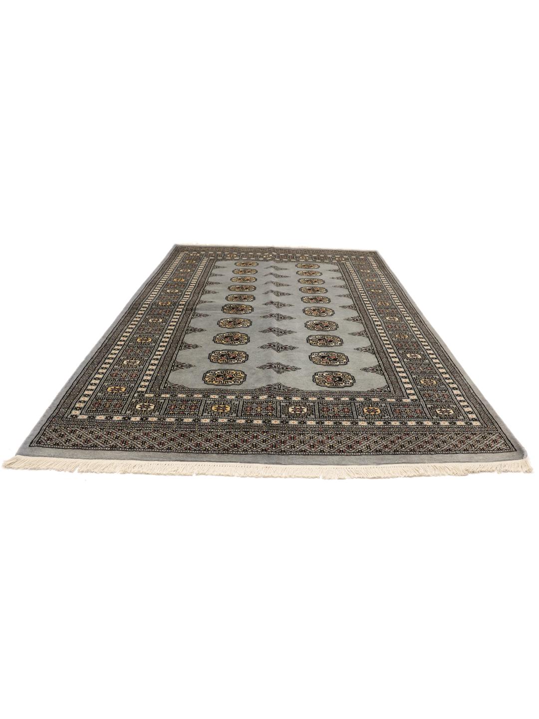 Hand-knotted Pakistani Bokhara rug in blue