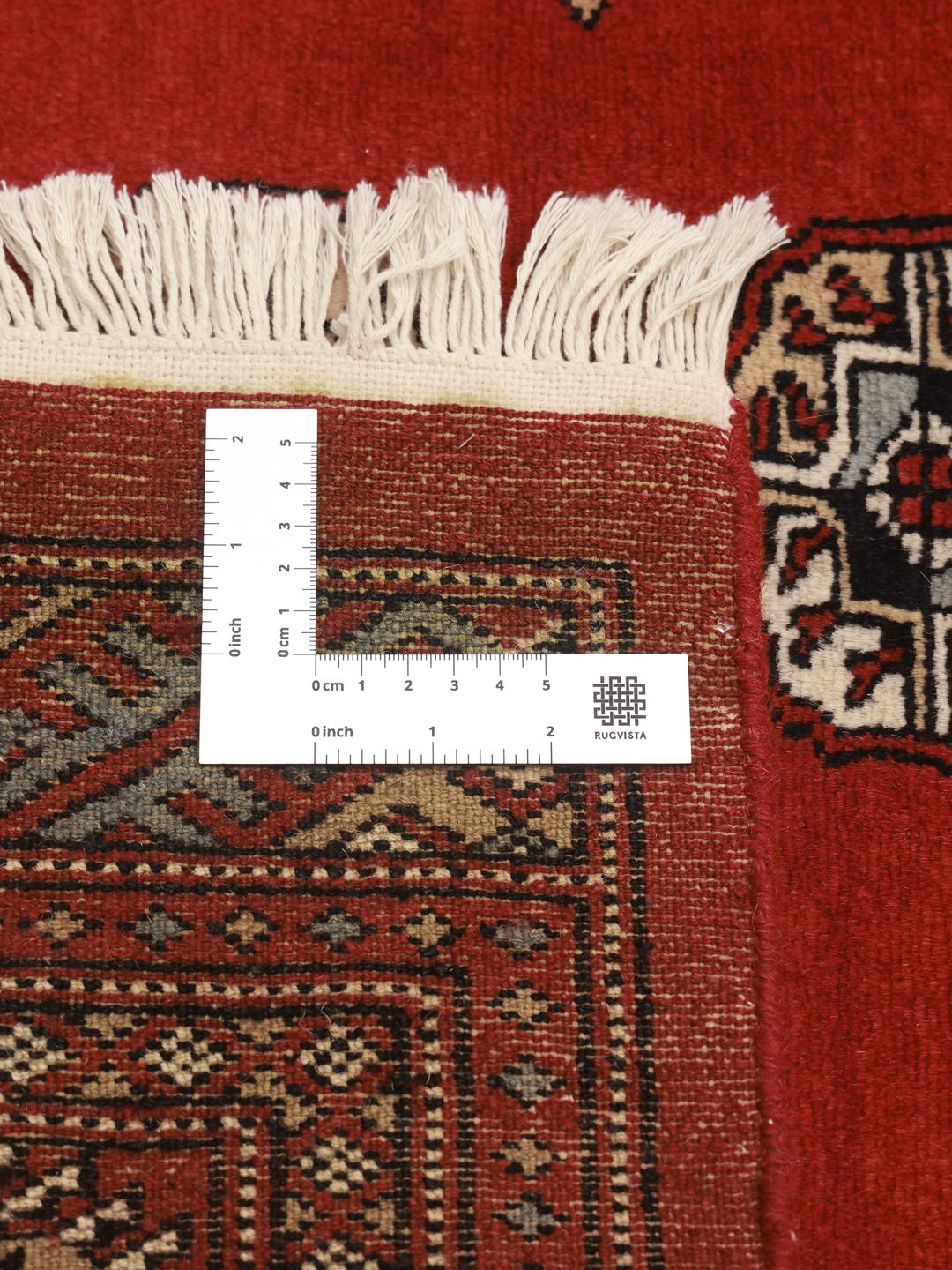 Handmade Bokhara rug from Pakistan in red