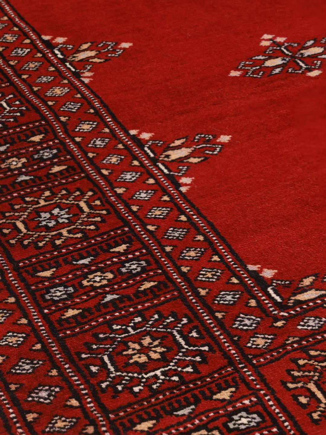 Tapis en laine du Pakistan noué à la main en rouge