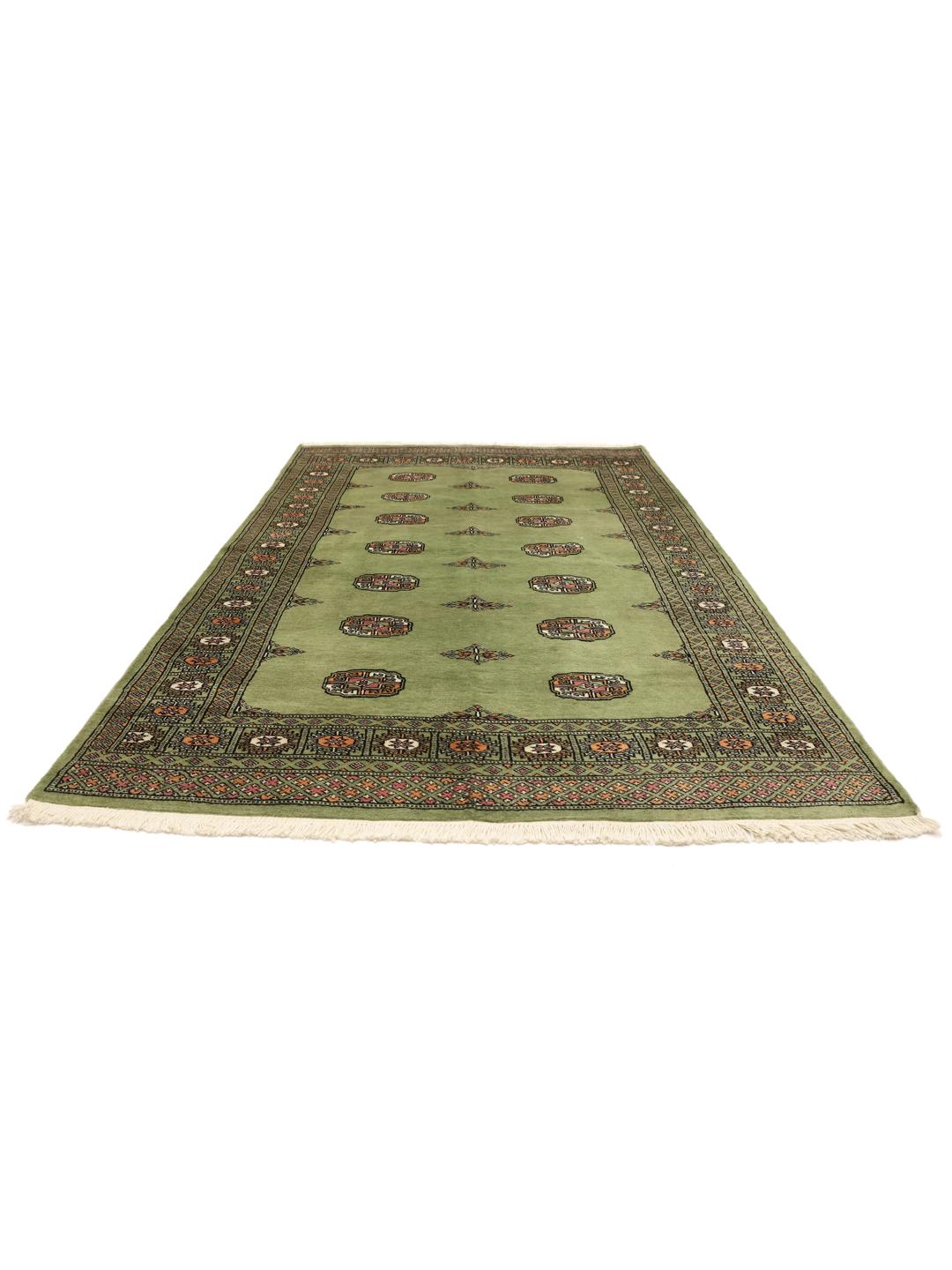 Tapis en laine pakistanaise noué à la main en vert