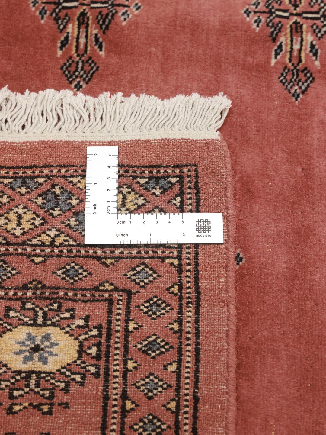 Handmade Pakistan Bokhara 2ply red rug with traditional motifs