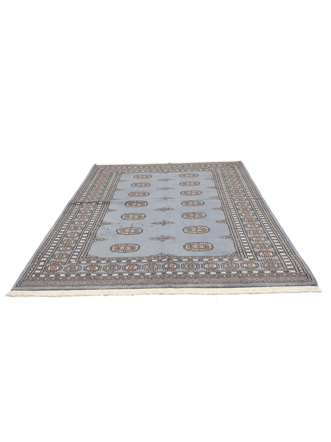 Hand-knotted Pakistan wool rug in blue with traditional patterns