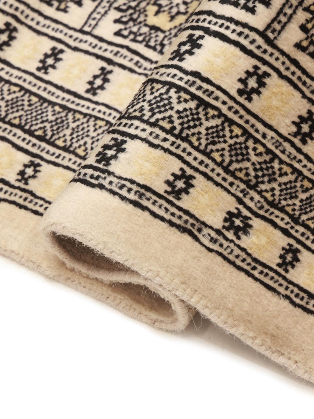 Handmade Pakistan wool rug in beige